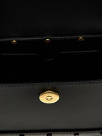 Sac à main en cuir noir