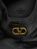 Sac à bandoulière en cuir noir